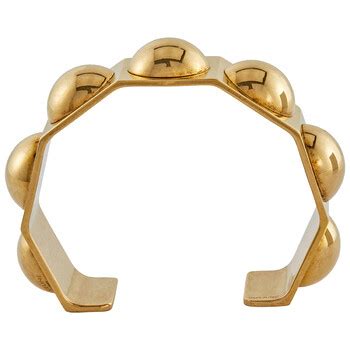 celine brass bangle stone|Clous Celine octogonal bangle in brass with vintage gold finish.